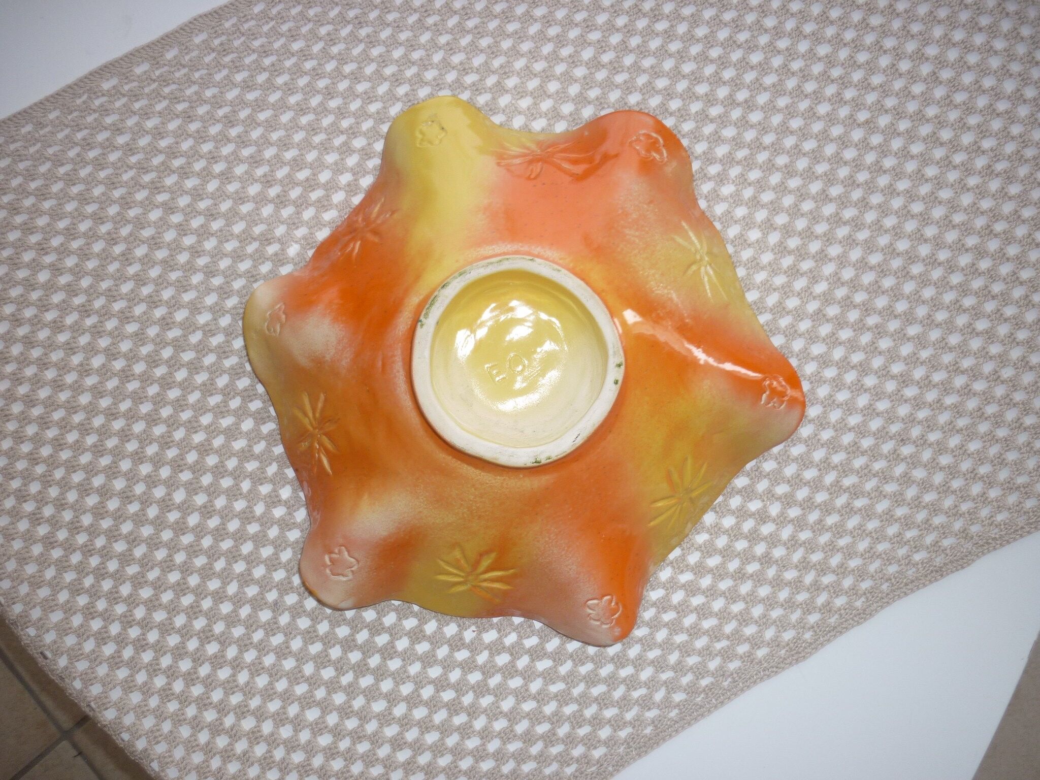 Yellow and orange ceramic salad dish