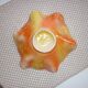 Yellow and orange ceramic salad dish