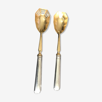 Pair of serving spoons in silver hallmark neck brace