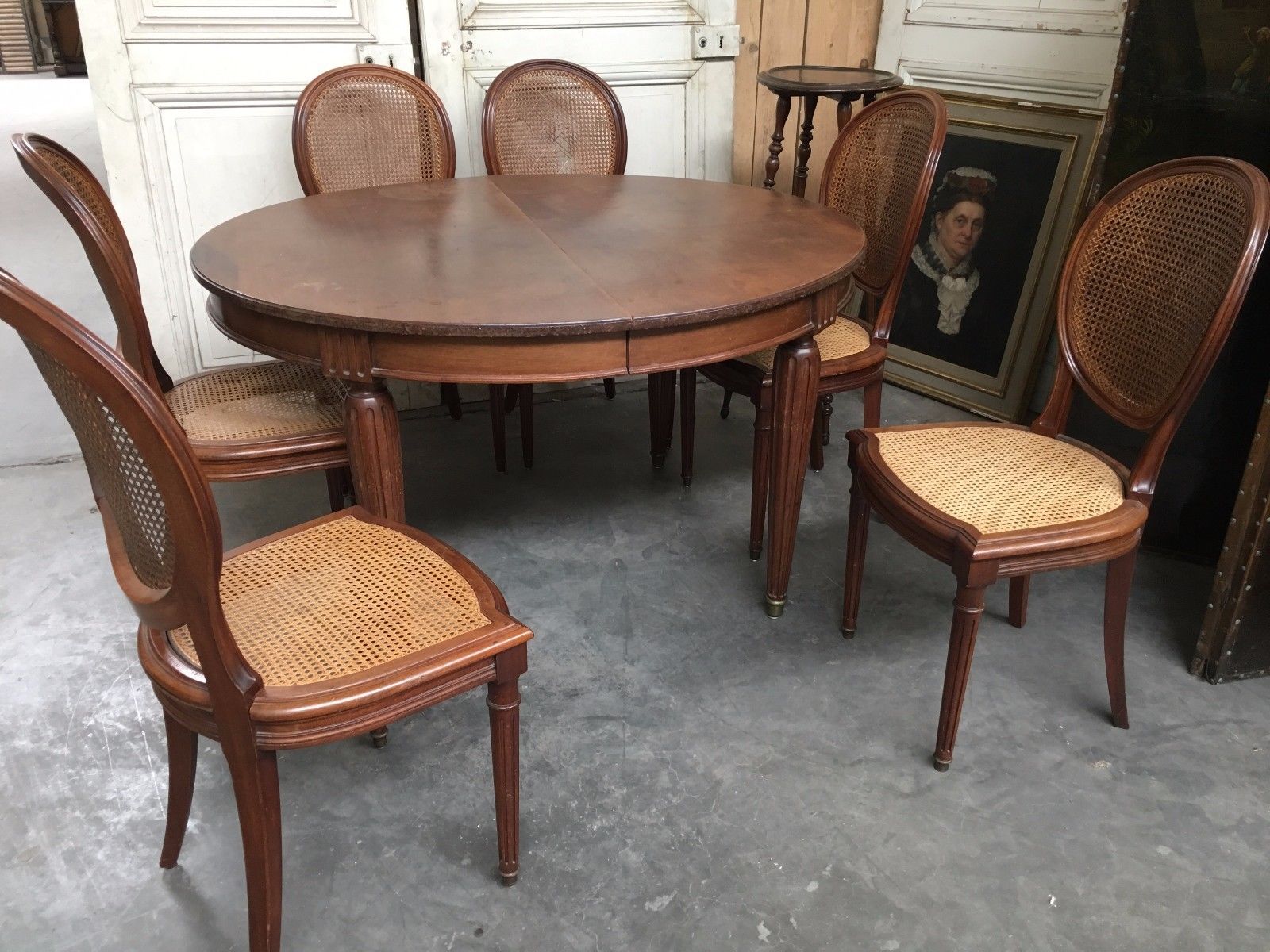 Table and six chairs in the Louis XVI style mahogany