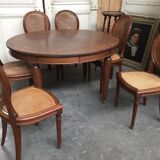 Table and six chairs in the Louis XVI style mahogany