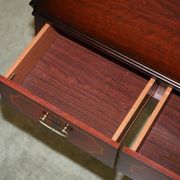 Small console with two drawers in hardwood finish.