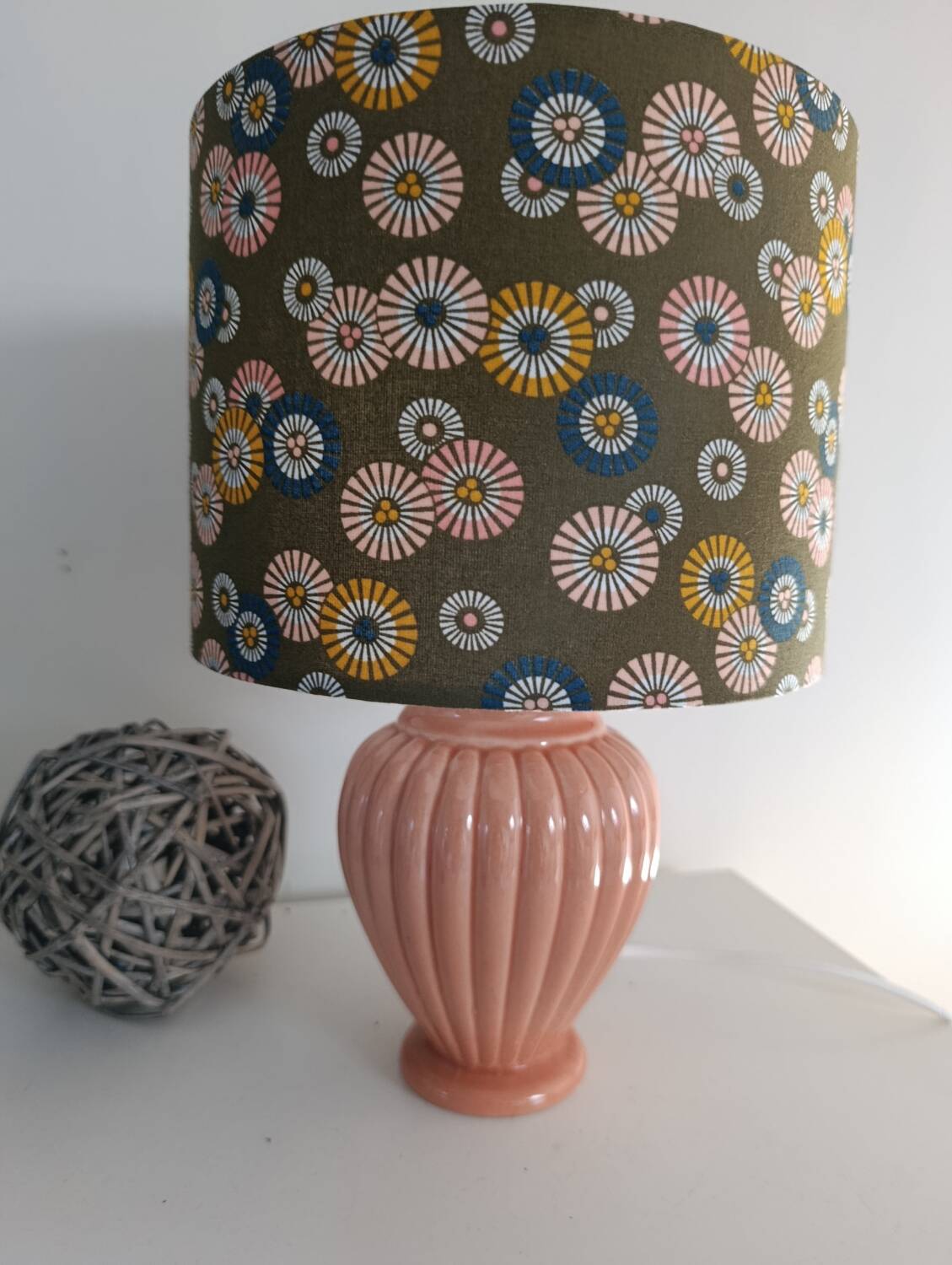 Coral tar ceramic lamp, khaki lampshade with flowers.