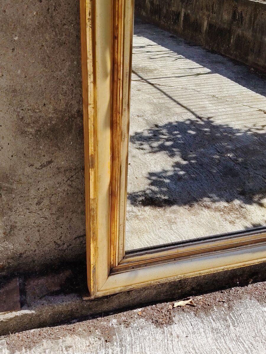Large mirror/19th-century wooden frames, gilded.