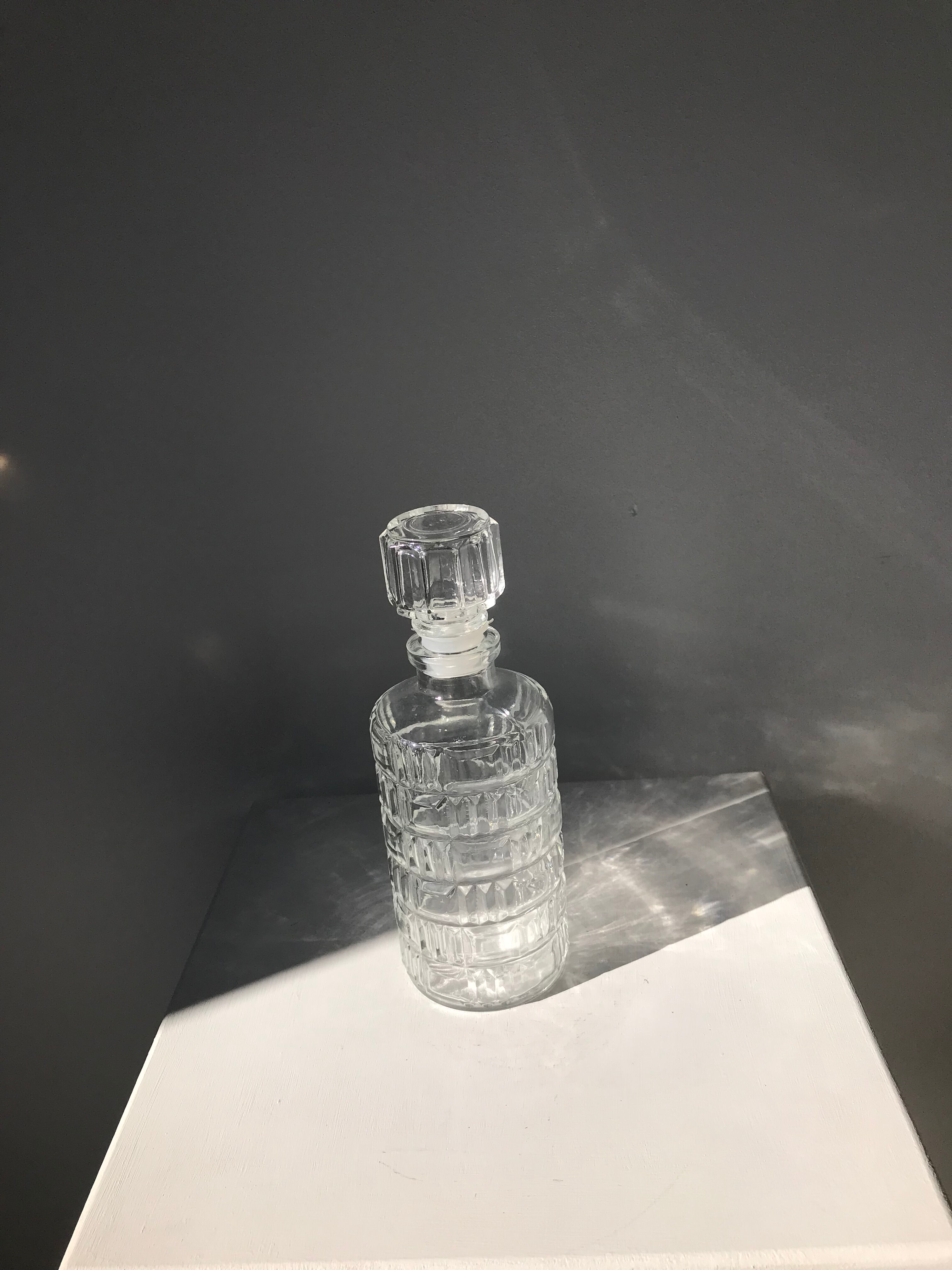 Vintage whisky decanter in glass