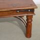 Square coffee table in exotic wood and wrought iron.