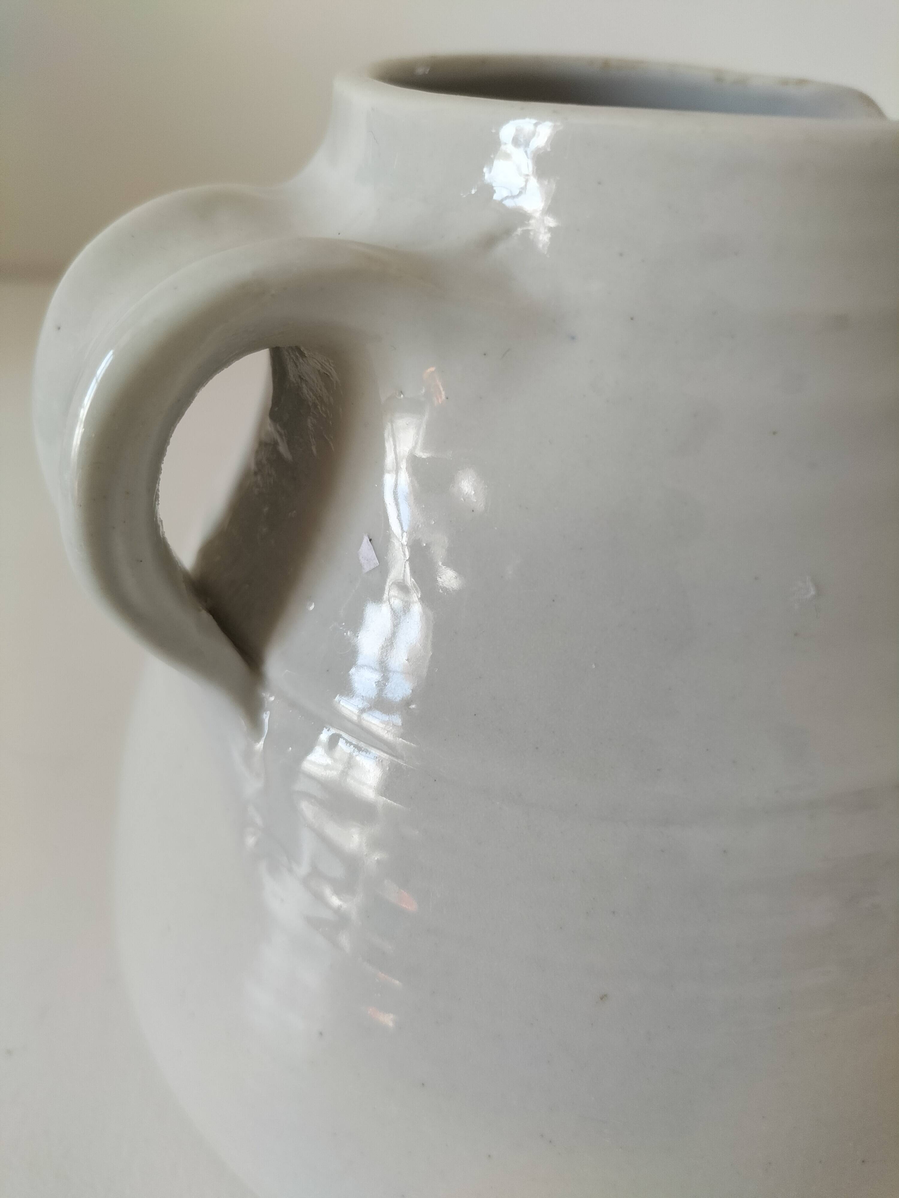 Hand-thrown white stoneware pitcher – signed artisanal ceramic