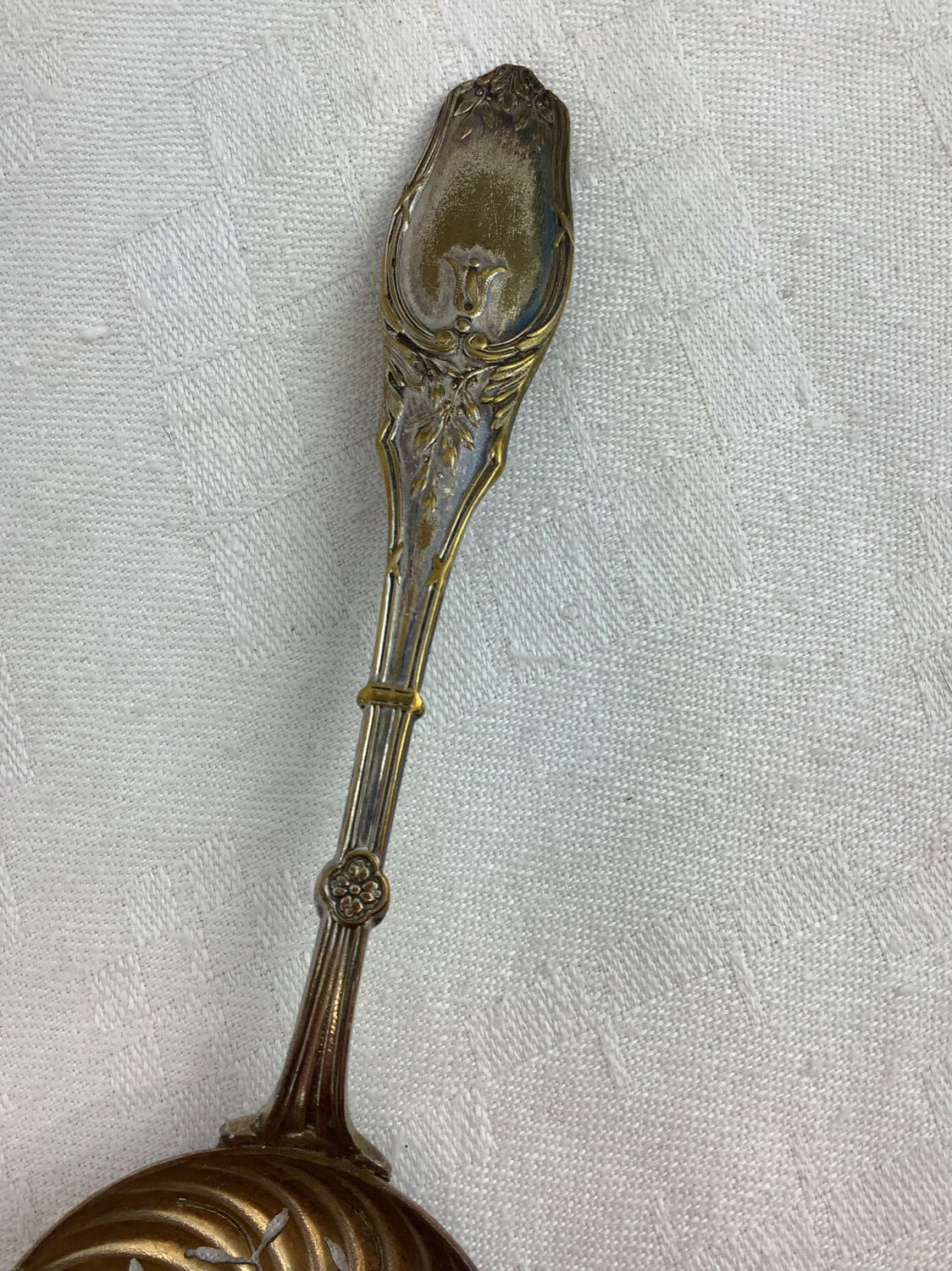 Old sprinkling spoon