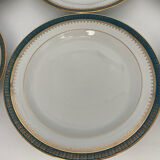 Six slightly hollow Limoges porcelain plates.