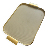 Plastic tray and vintage brass