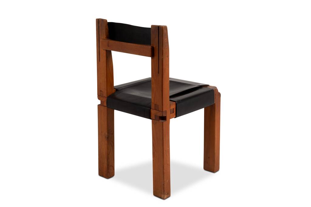 Pierre Chapo. Series of 8 "S11" chairs in elm and leather. 1960s-70s.