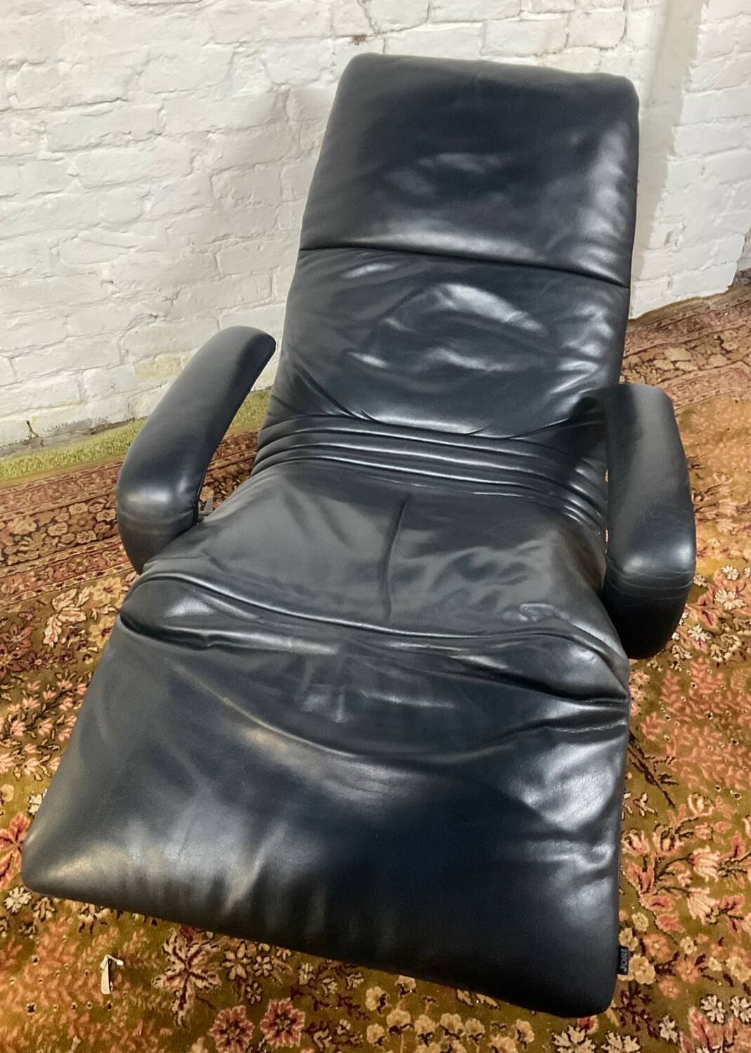 Jori black leather relax armchair from the 80s