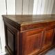 Large antique haberdashery counter in oak