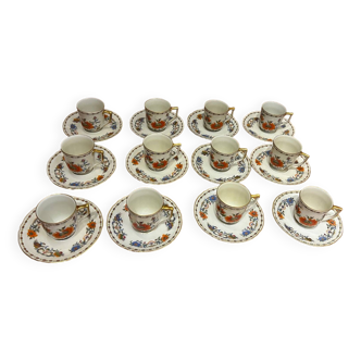 Service of 12 Raynaud porcelain coffee cups, Limoges, 1950s.