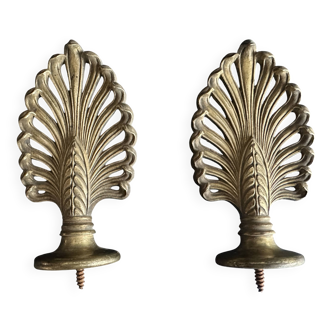 Pair of bronze curtain rod finials in the Napoléon III style with a palmette design.