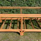 Table basse vintage en rotin et verre