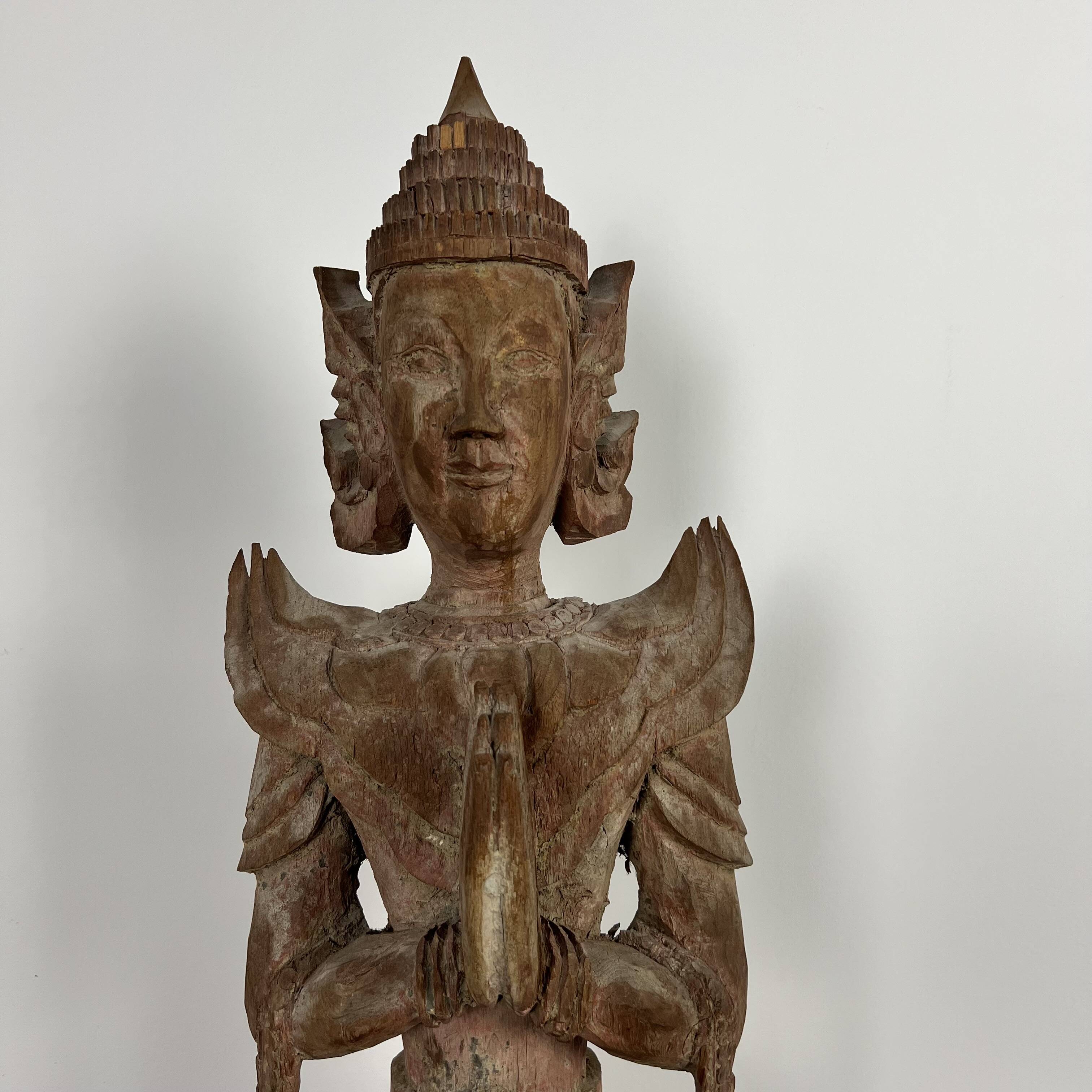 Grande statuette de kinaree, adorant, devi en bois sculpté. Thailande