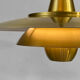 Large brushed aluminum pendant light with golden finish. Produced by Jeka. Denmark 1970s