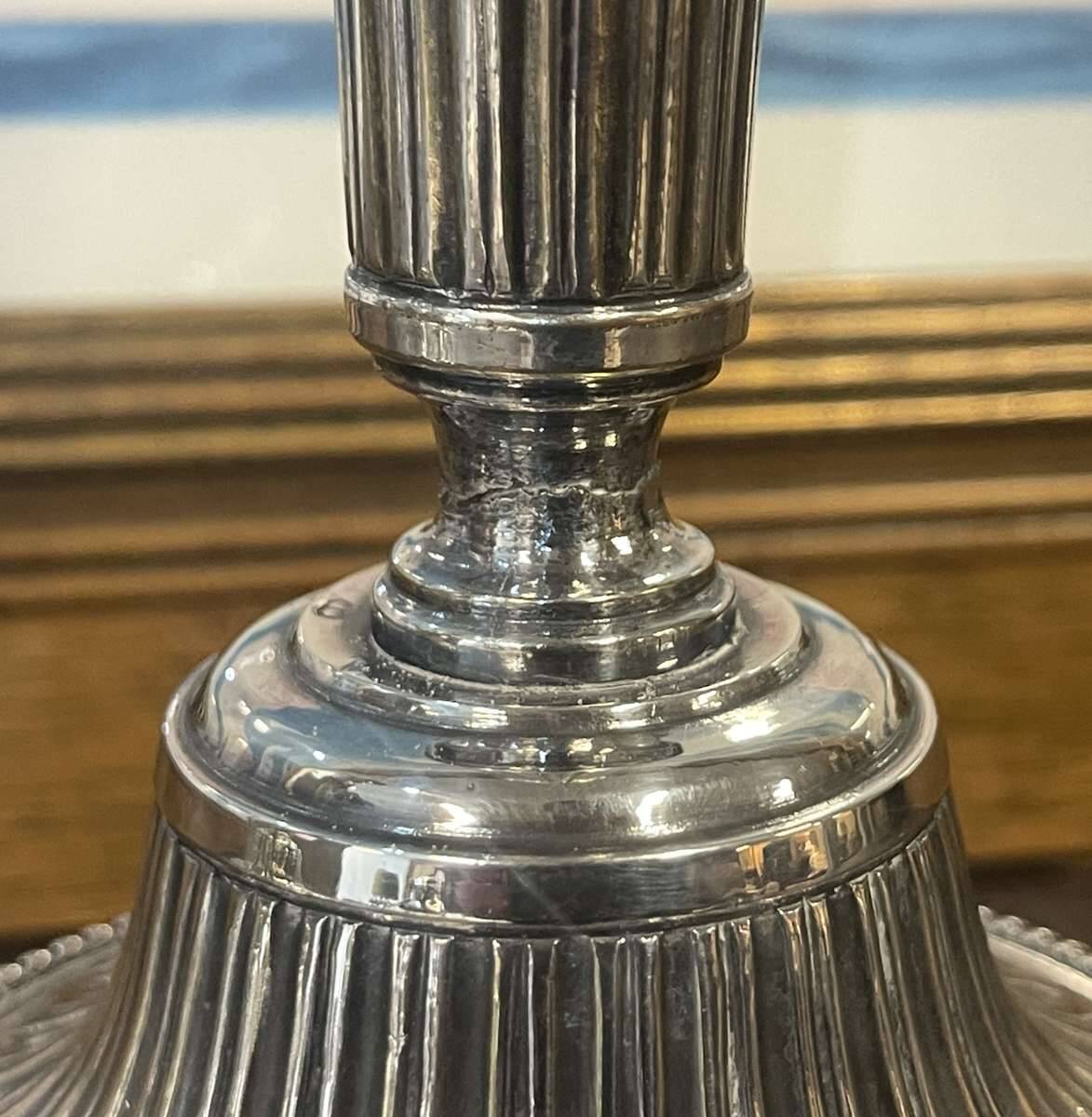 Pair of silver-plated bronze candlesticks from the early 20th century