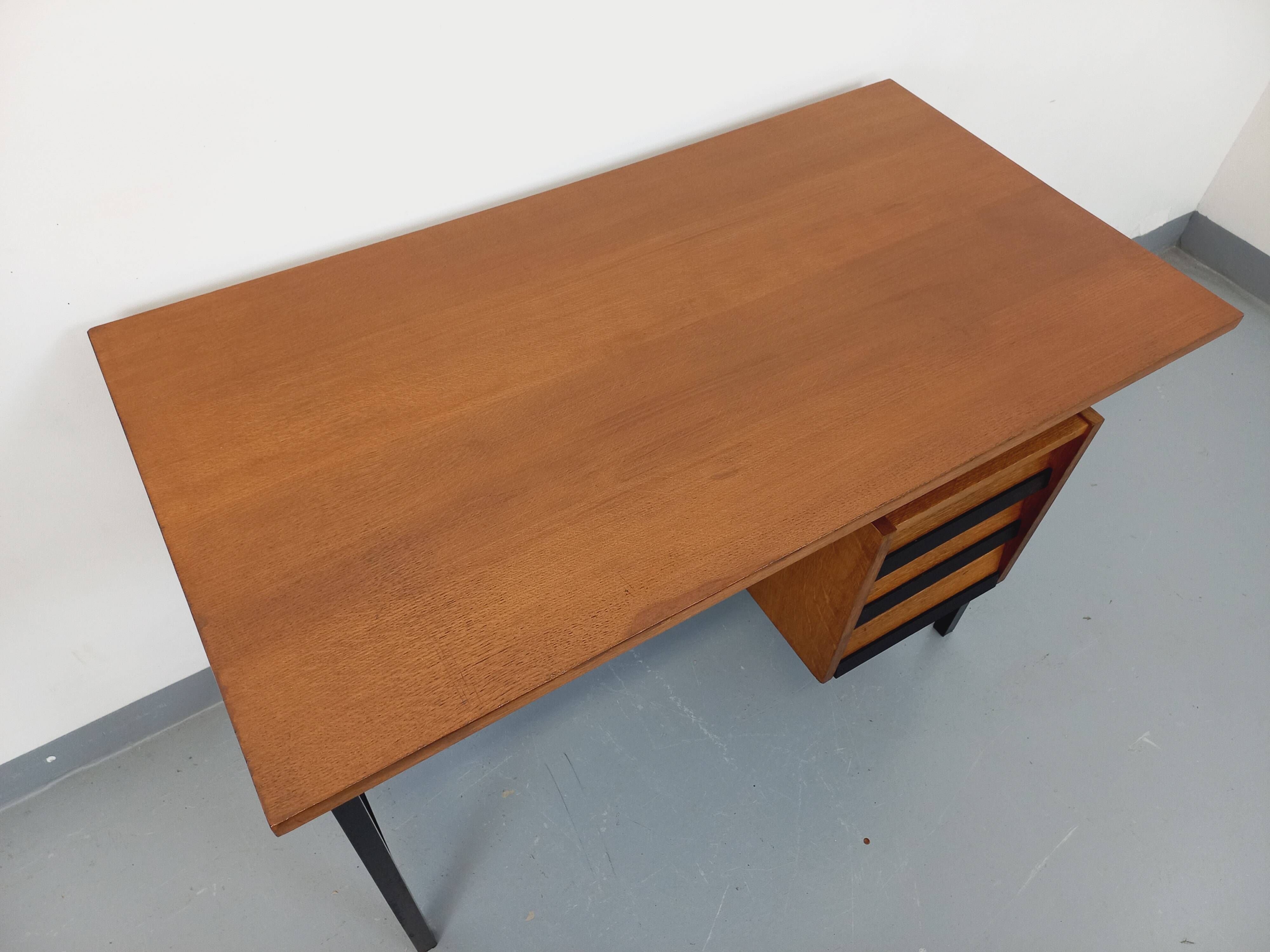 Vintage modernist desk in wood and black metal from the 60s