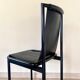 4 postmodern design chairs in black metal and leather, 1980's
