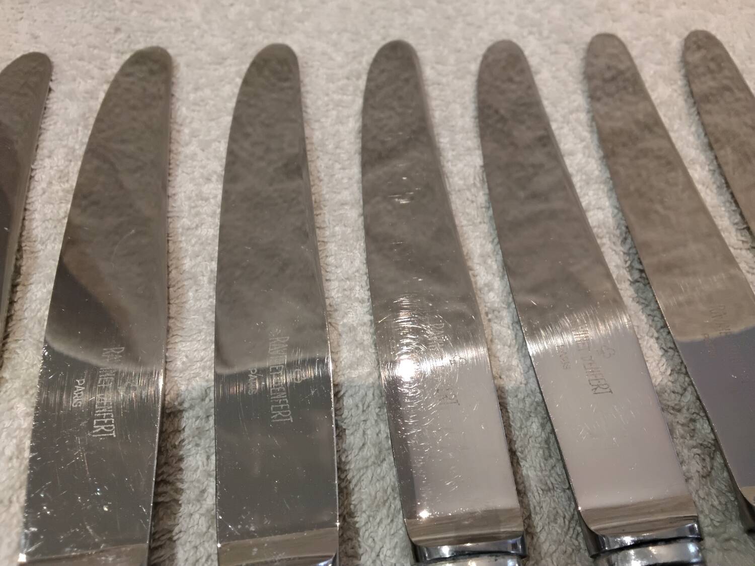 12 silver-plated metal table knives by the silversmith Ravinet Denfert, Empire style, model 81.