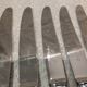 12 silver-plated metal table knives by the silversmith Ravinet Denfert, Empire style, model 81.