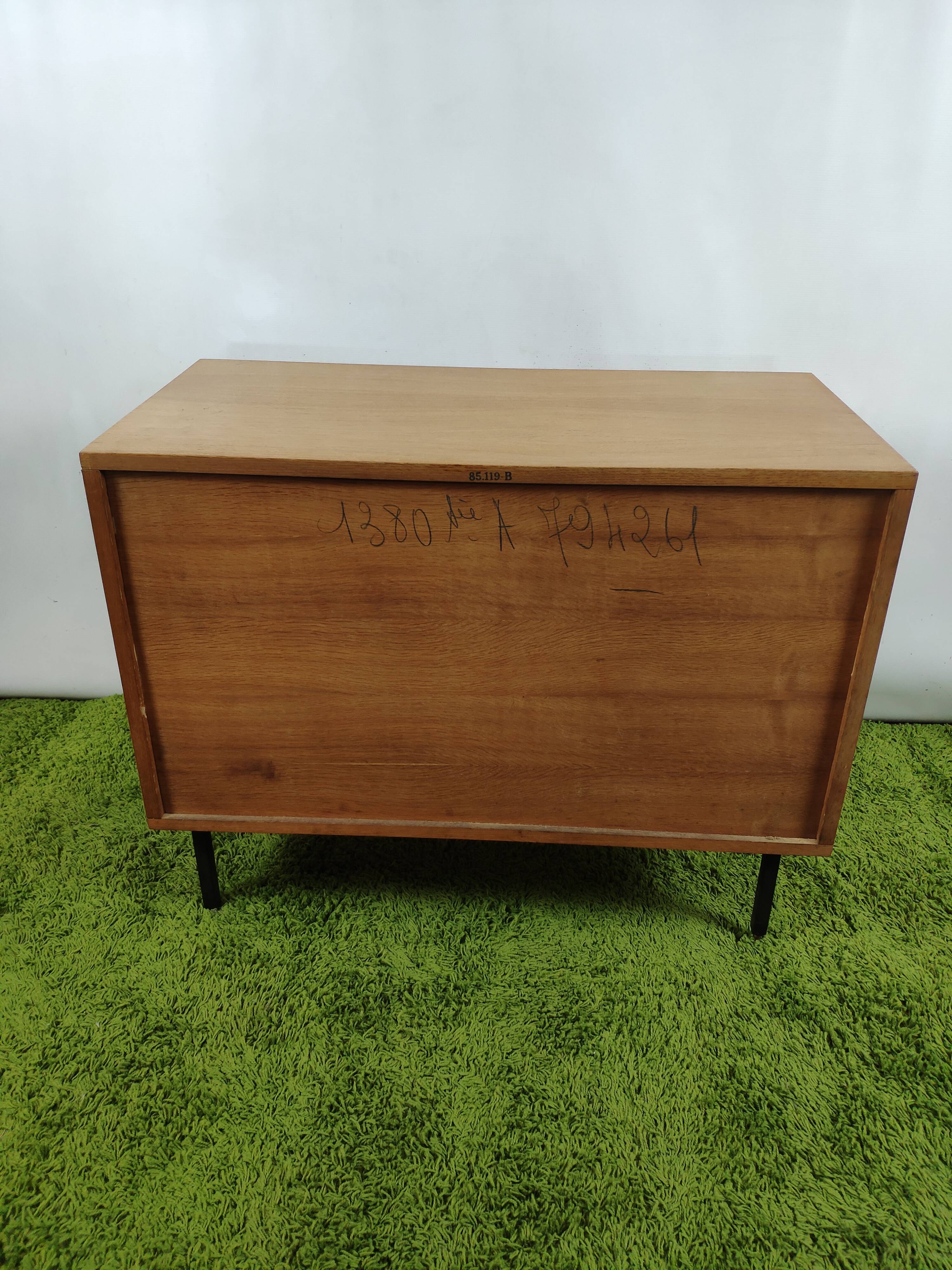 Wooden chest of drawers with gilded handle