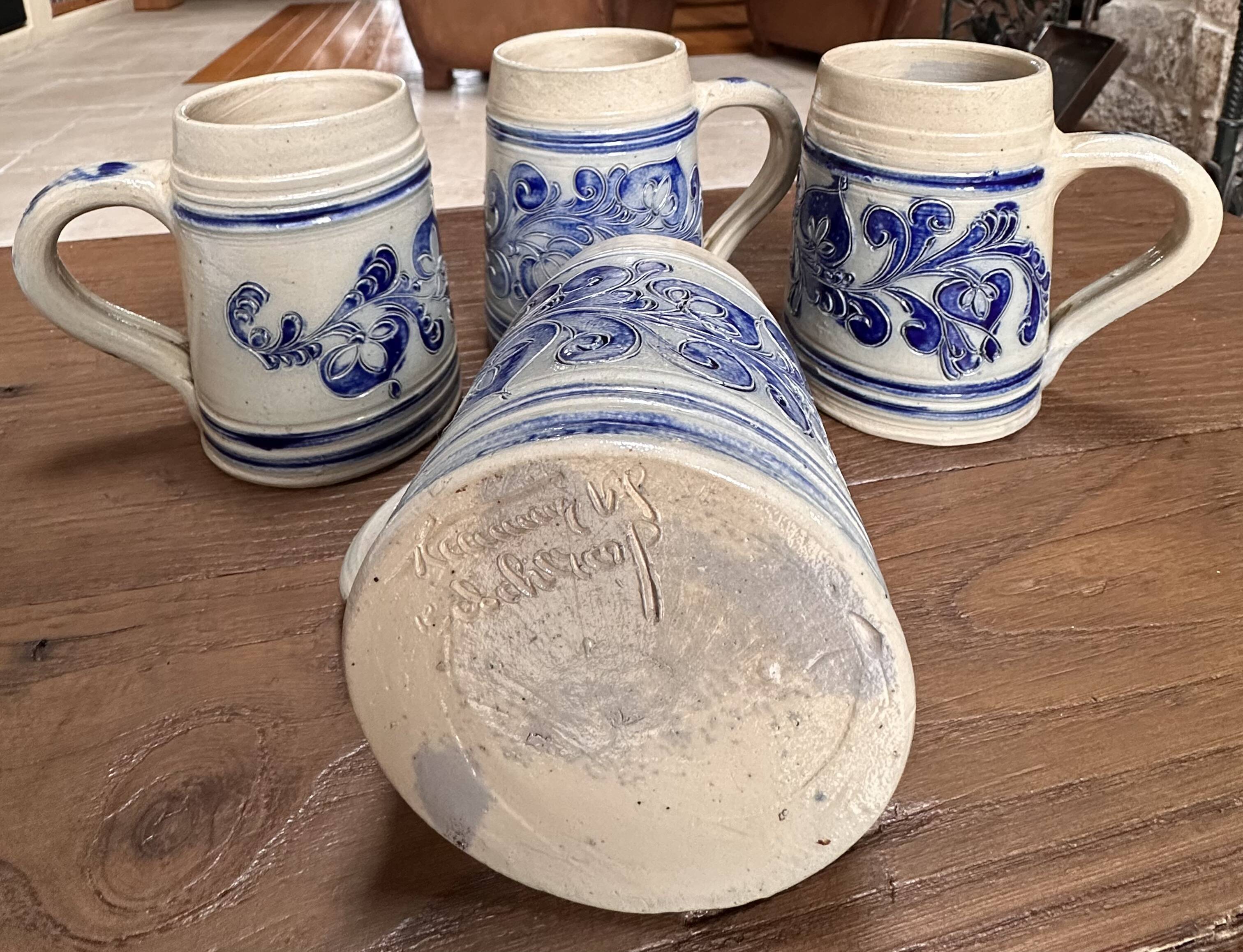 Lot of 4 Alsatian stoneware mugs signed Rémy Belsdorf.