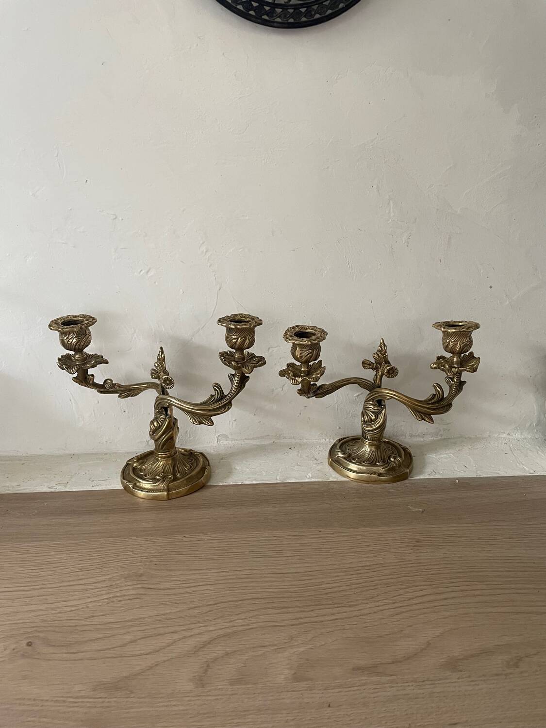 Pair of rocaille candlesticks in gilded bronze