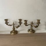 Pair of rocaille candlesticks in gilded bronze