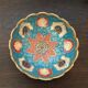 Small empty cup-pocket golden brass chiseled and painted oriental style