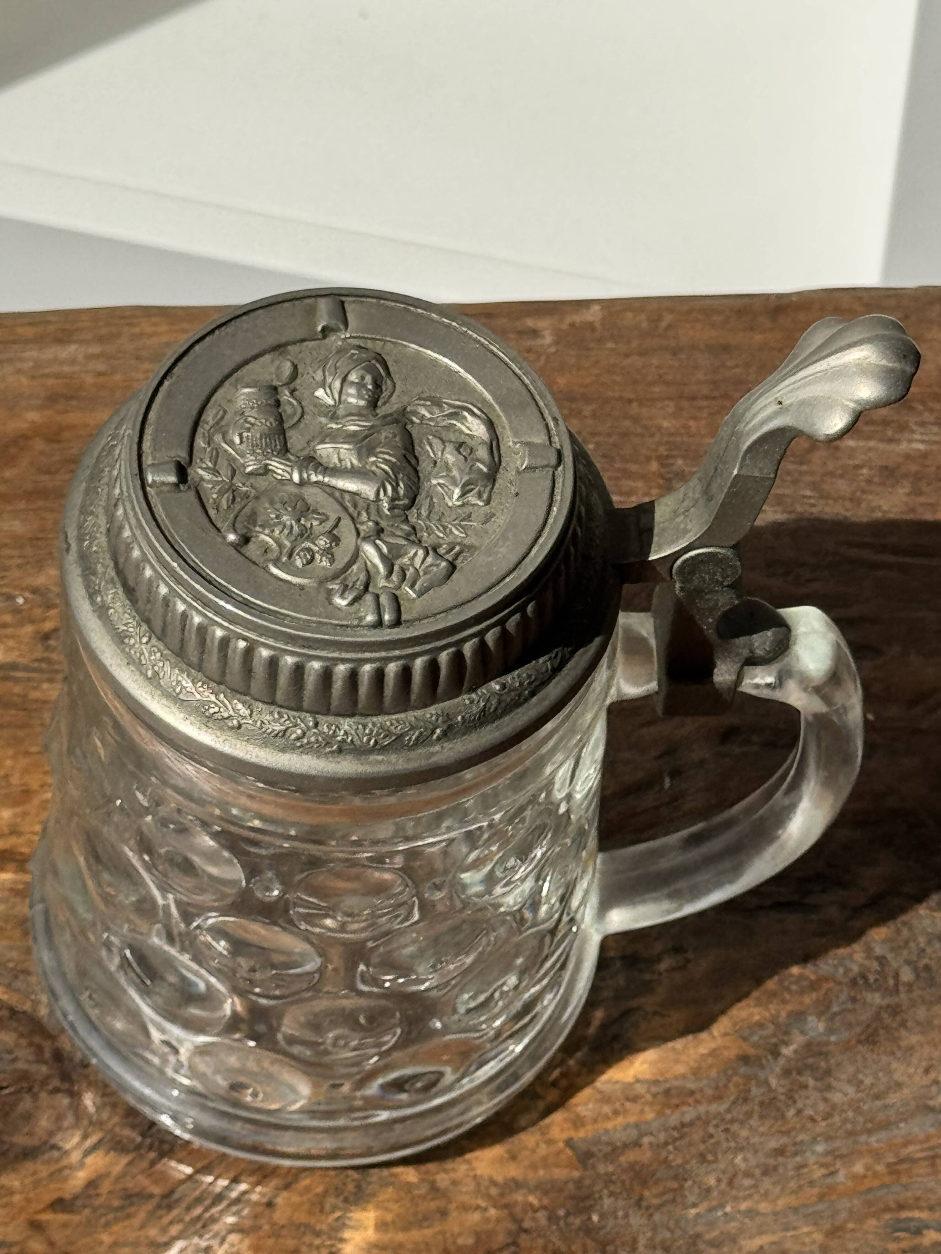 Alsatian beer mug with figurative pewter lid