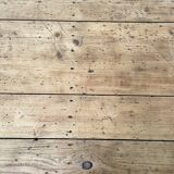 Solid wood workshop table with straight legs.