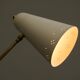 Mid Century adjustable table lamp with perforated shade from the 1950s.