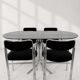 Vintage chairs with double chrome structure and black velvet. 70s