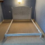 White wooden cane bed