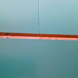 Extendable oval teak dining table