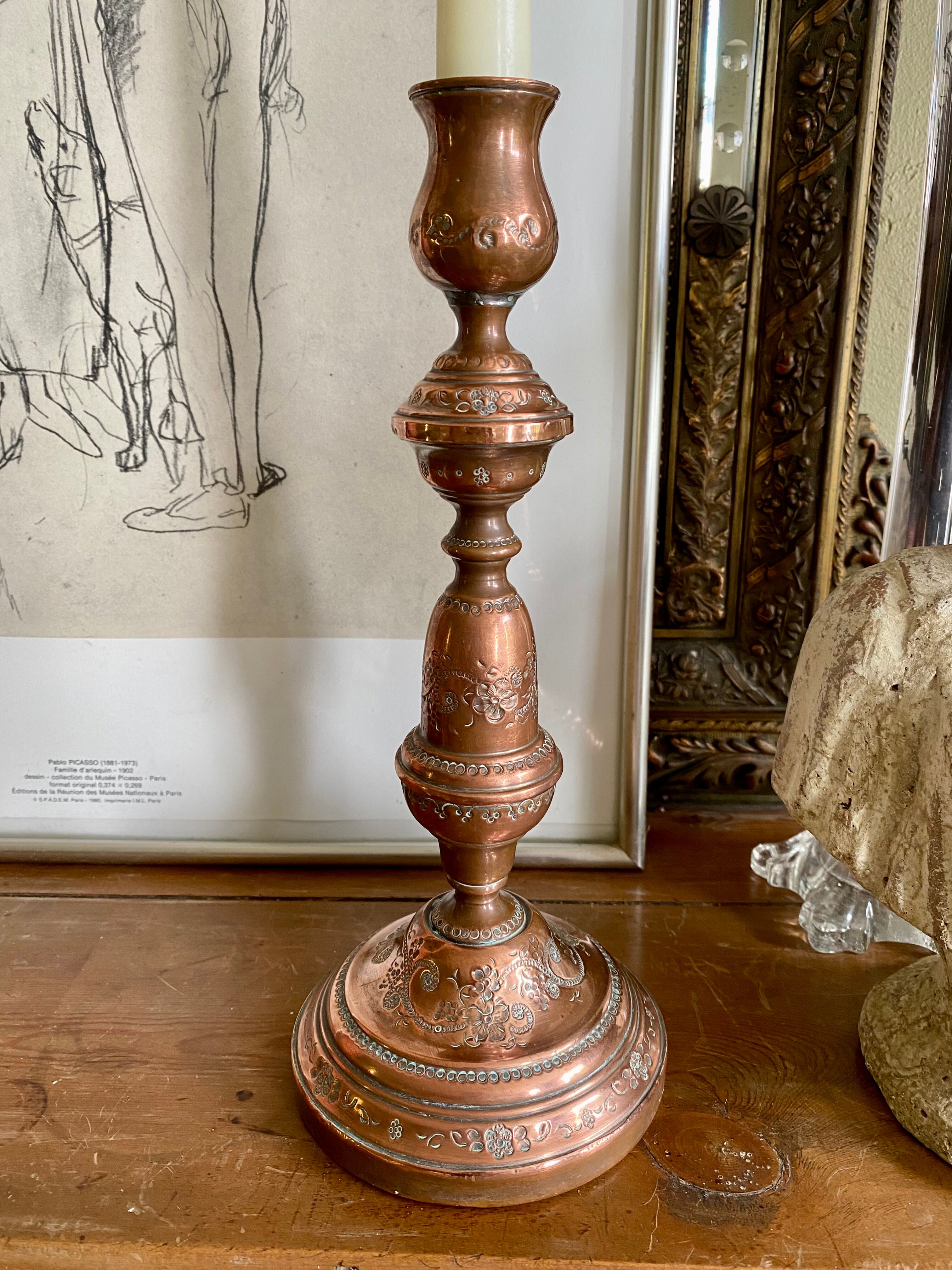 Old copper candle holder