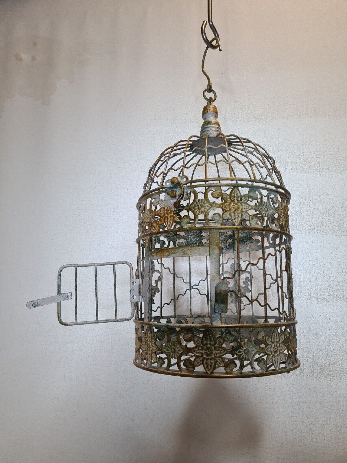 Round weathered iron birdcage