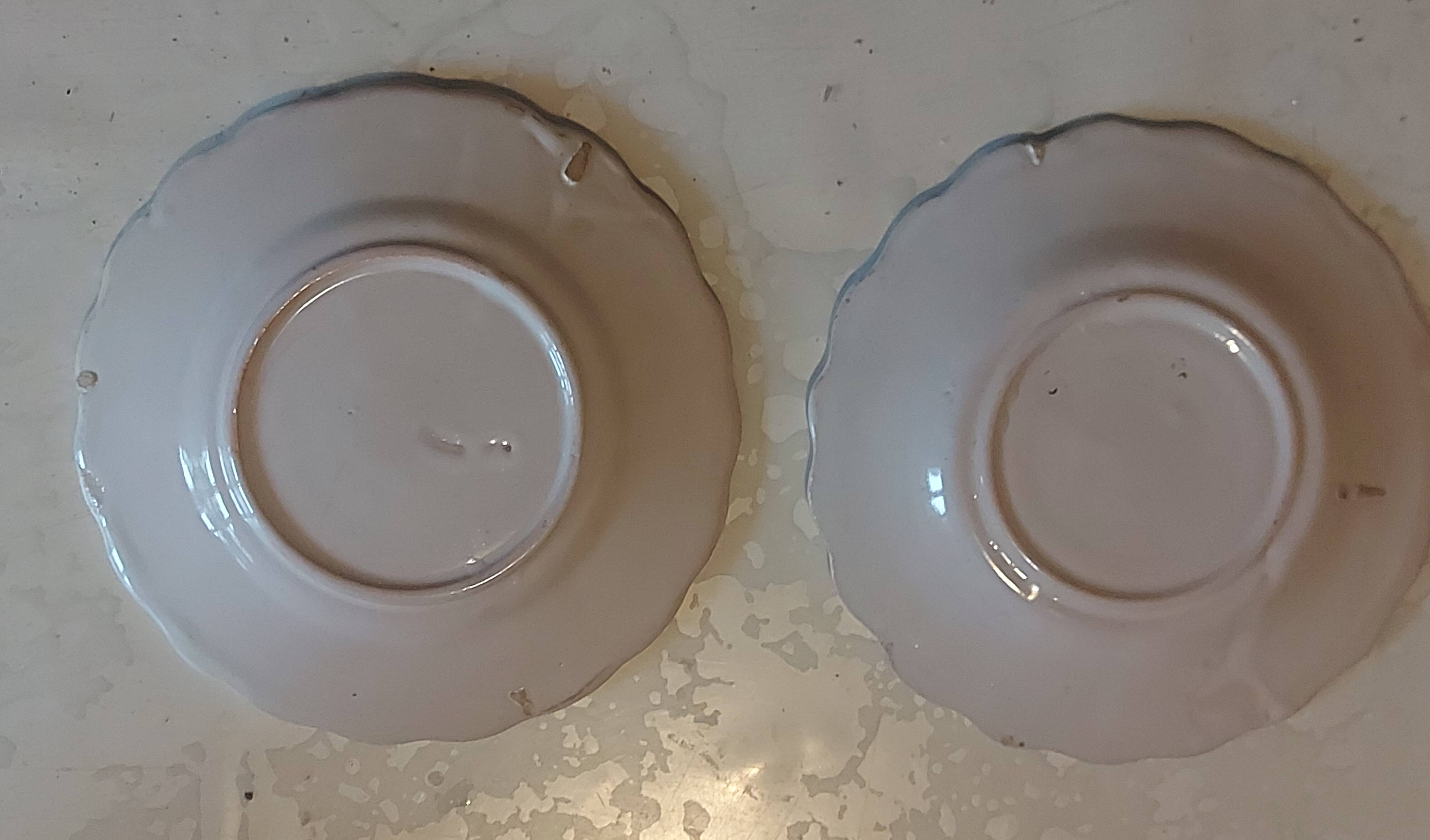 Two antique bowls signed HR from Quimper.