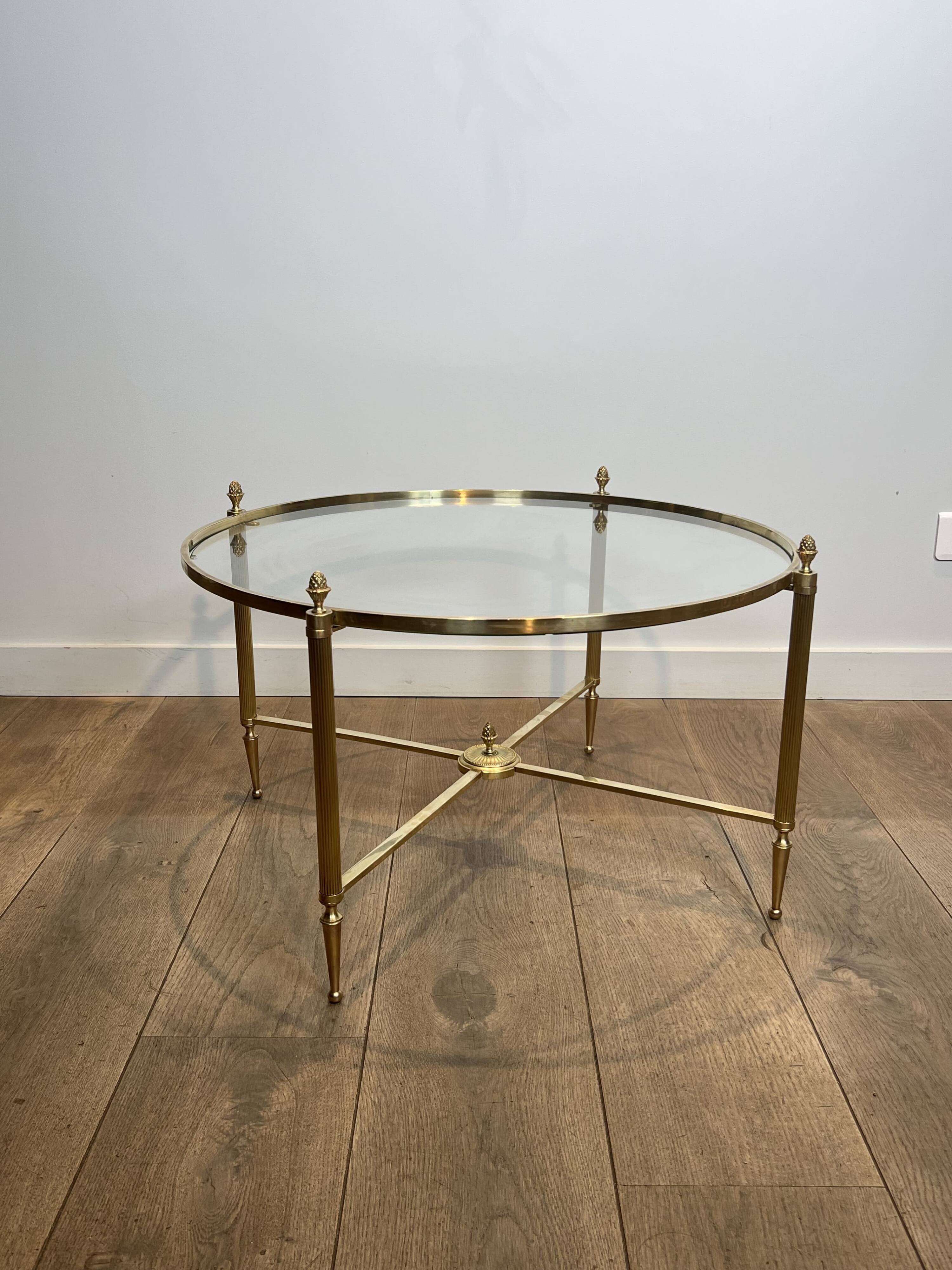 Neoclassical Round Coffee Table in Brass with Fluted Supports and Floral Motifs