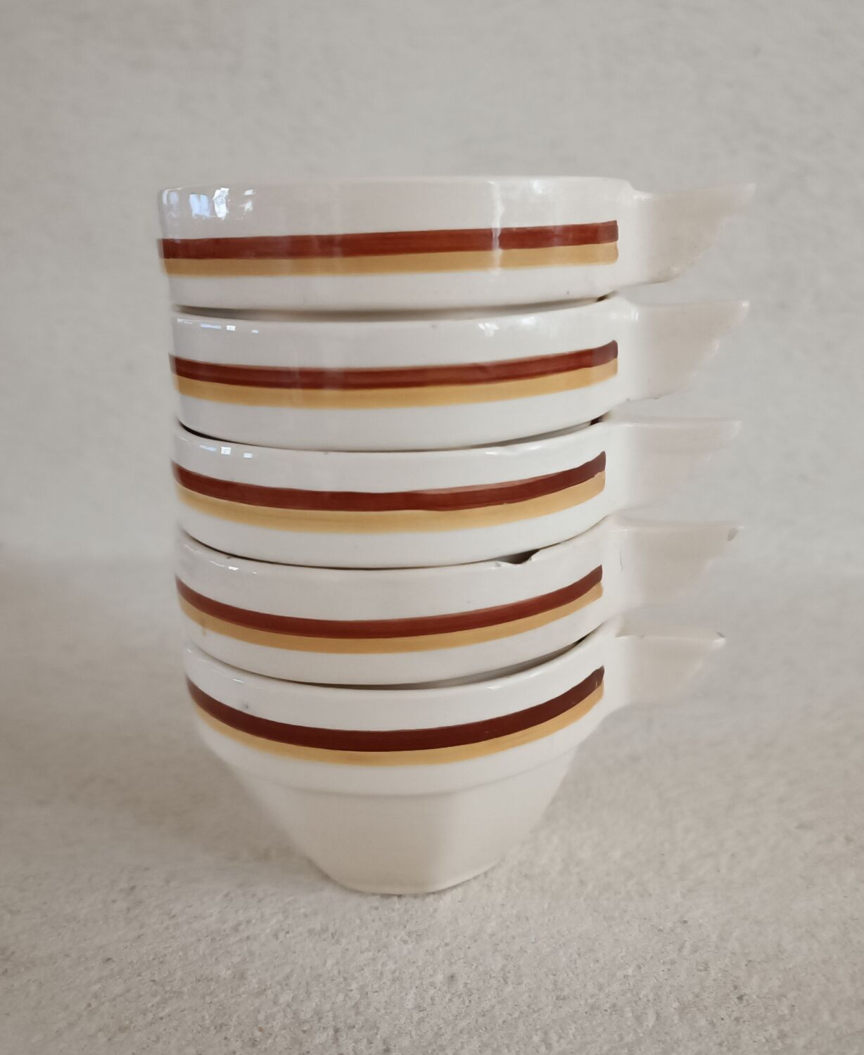 Set of five Digoin Sarreguemines cups