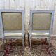 Paire de fauteuils de style Louis XVI en bois patiné