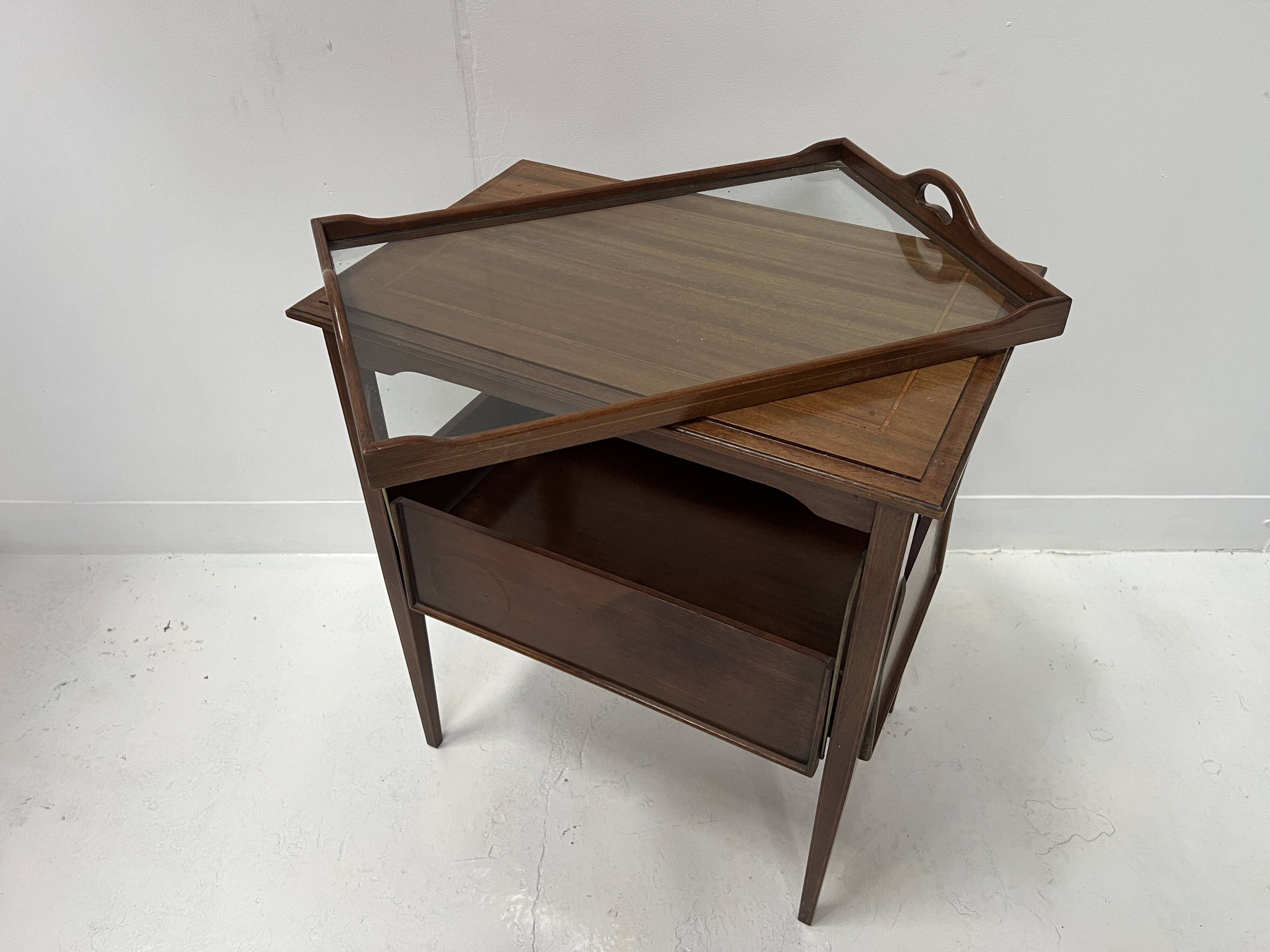 Mahogany serving table with marquetry inlay decoration, 20th century.