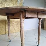 Round walnut shutter table