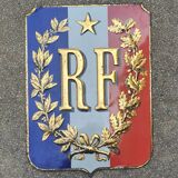Sheet metal plate carries the flag of the French Republic