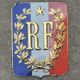 Sheet metal plate carries the flag of the French Republic