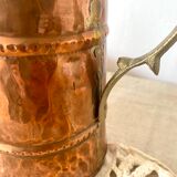Antique copper and brass pitcher