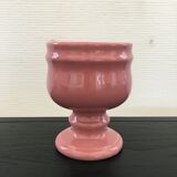 Pink flowerpot on stand